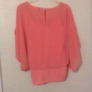 Coral blouse with fitted waist
